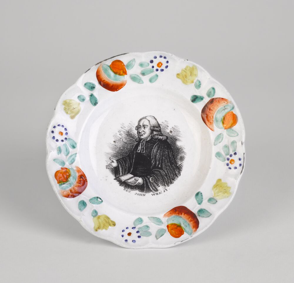 Hand-painted saucer with an image of John Wesley