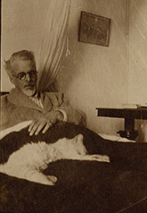 Photograph of W.B. Yeats with his cat