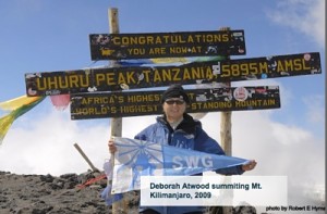 Deborah Atwood summiting Mt. Kilimanjaro, 2009