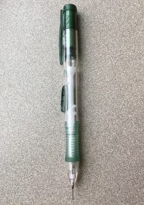 A mechanical pencil that is likely similar to one that the lead from the empty case was used in