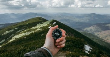 Compass navigation on top of mountain