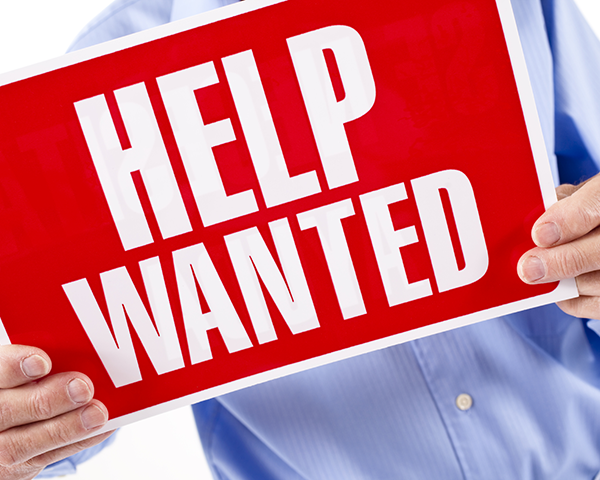 Photo of a Help Wanted sign