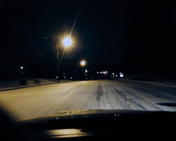 Photo of an icy road late at night