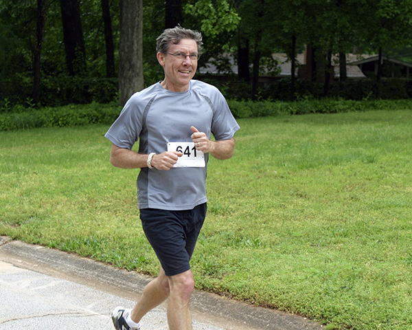 Photo of Norman Hulme running a 5k