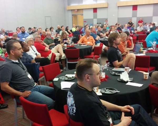 Photo of conference attendees during a keynote address