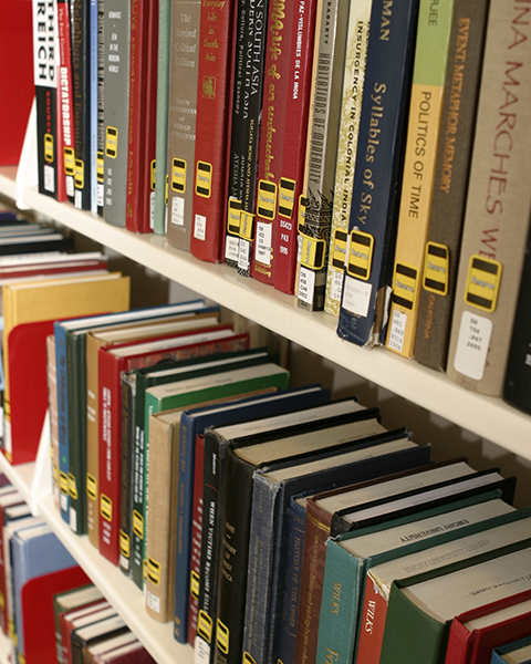 Photo of books on a library shelf