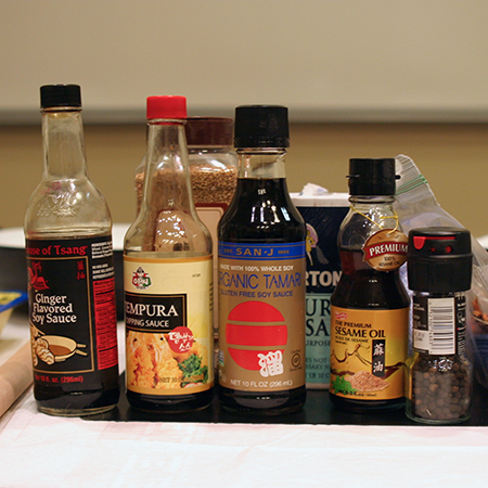 Photo of bottles of soy sauce, sesame oil, and tempura dipping sauce 
