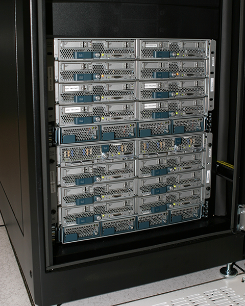 Photo of new Cisco switches in data center.