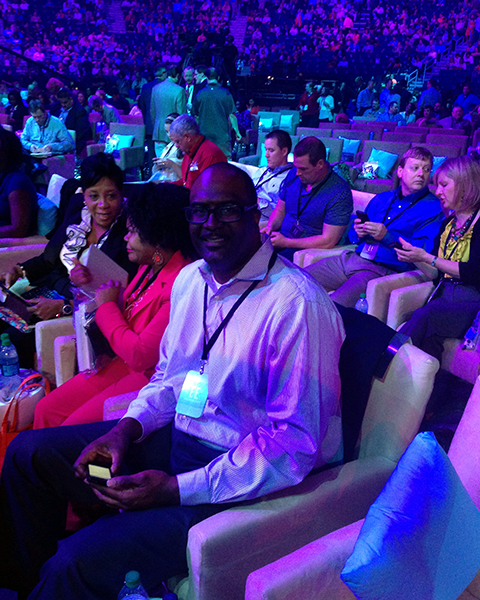 Photo of OIT staff in a large auditorium.