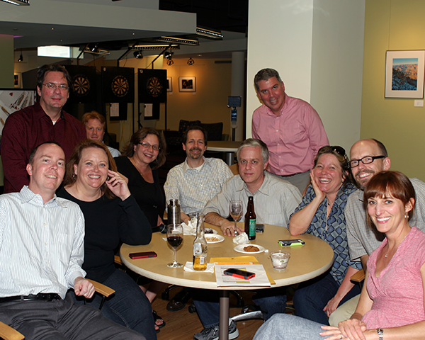 Group of UTS staff sitting at a table