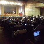 Photo of an auditorium during a presentation