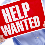 Photo of a Help Wanted sign