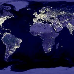 Image of earth with lights on in major population areas