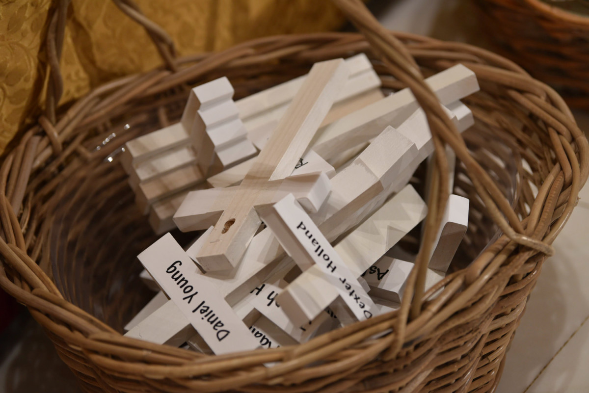 Basket of crosses with the names of those who had died on the streets. 