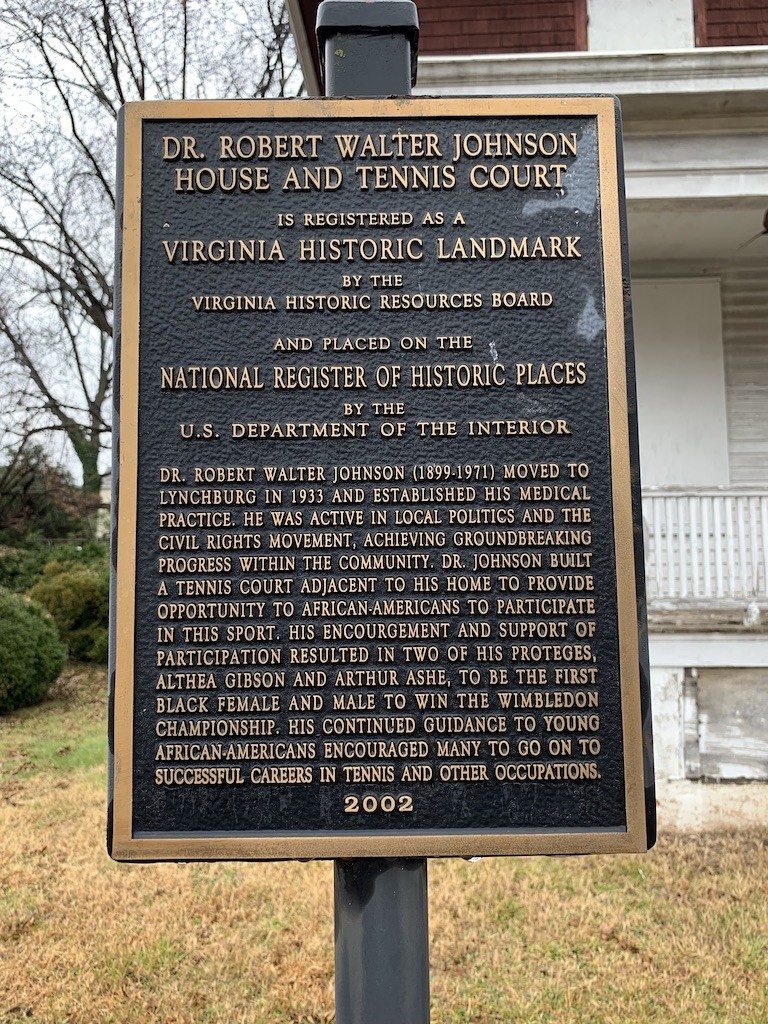 National Register of Historic Places sign for Robert Walter Johnson home and court.