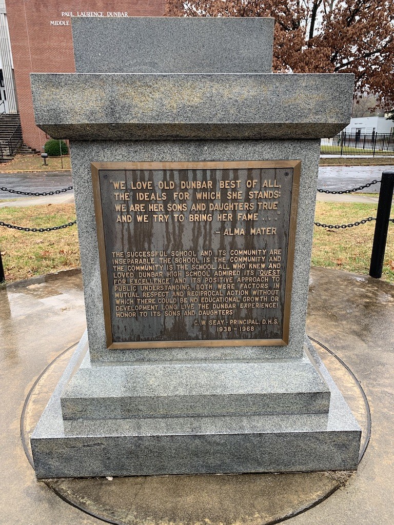 Stone monument with Dunbar's alma mater and a quote from C.W. Seay