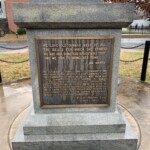 Stone monument with Dunbar's alma mater and a quote from C.W. Seay