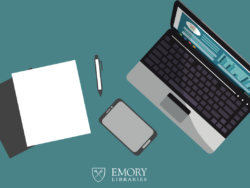 Notebooks, phone, pen, and a laptop above the Emory Libraries Logo.