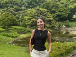 Library Leader Eva smiling at a park.