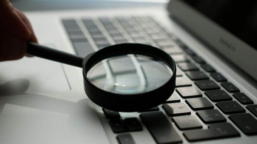 magnifying glass on laptop