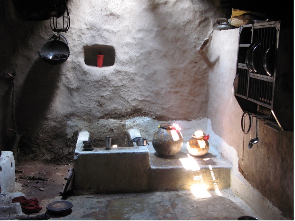 Traditional kitchen with taravani pots--goddess who takes form in two clay pots filled with rice water. Jupally Village, Telangana, 2007. Photo by Joyce Burkhalter Flueckiger.