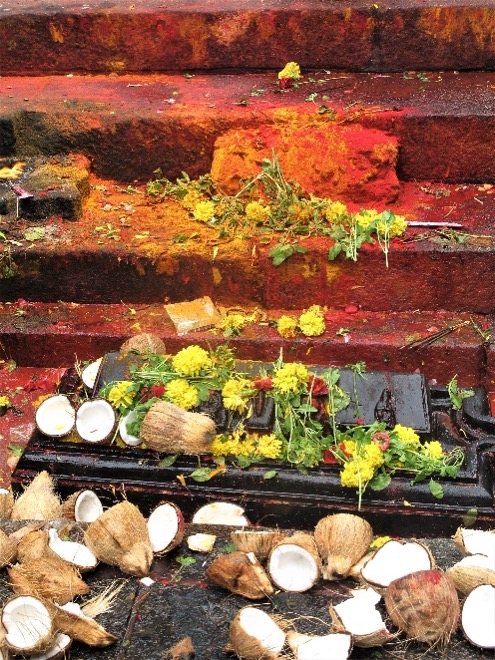 Ritual offerings at base of footpath up to Tirumala, Andhra Pradesh. Photo by Joyce Burkhalter Flueckiger.