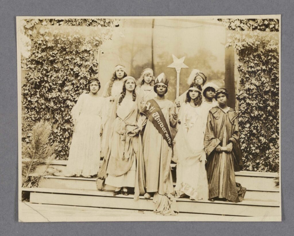 Students at Clark Atlanta University dressed in costume holding a star