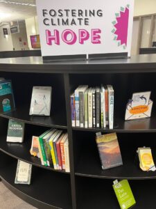 Photo of "Fostering Climate Hope" books on display